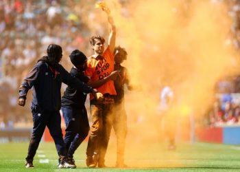 Protesters Disrupt English Premiership Rugby Final with Orange Paint Powder