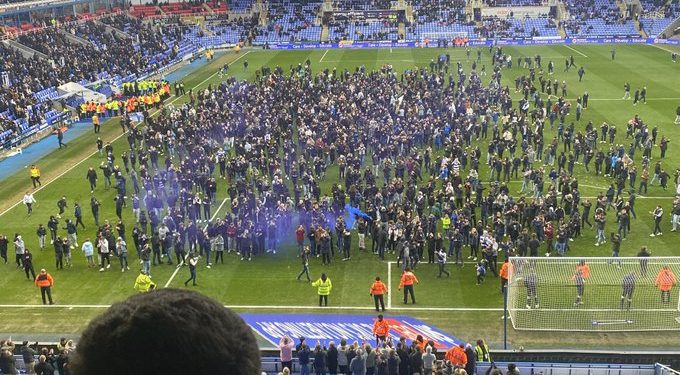 Pitch Invasion Halts Reading vs Port Vale Match Amid Protests Against Owner